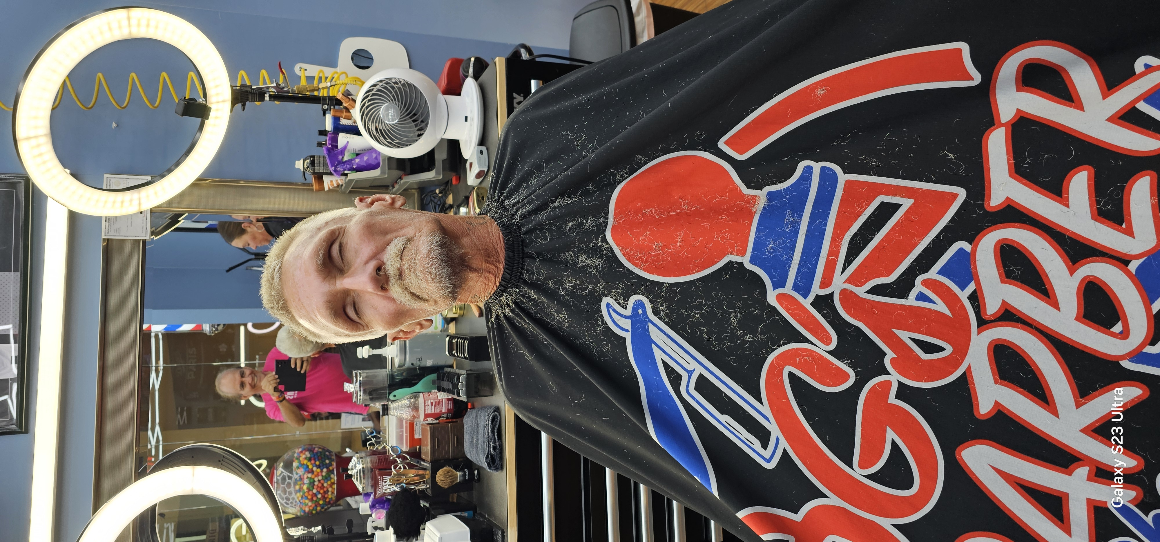 Lonnie getting a haircut at BG's Barber Shop